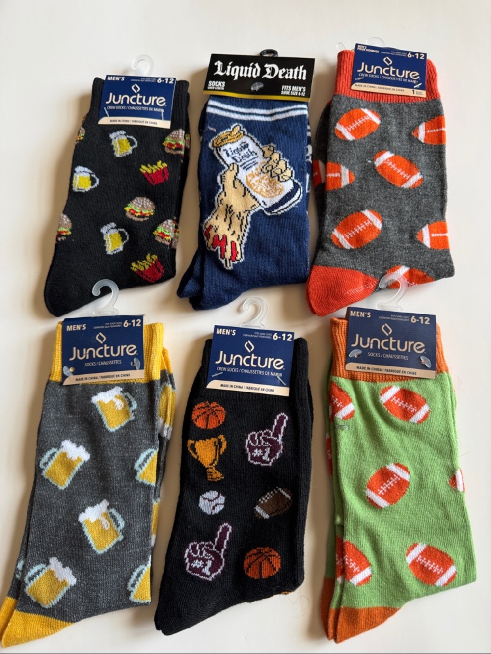 Pack of five NWT sports, drink and food themed socks.